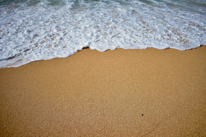 Ocean waves washing onto the shore